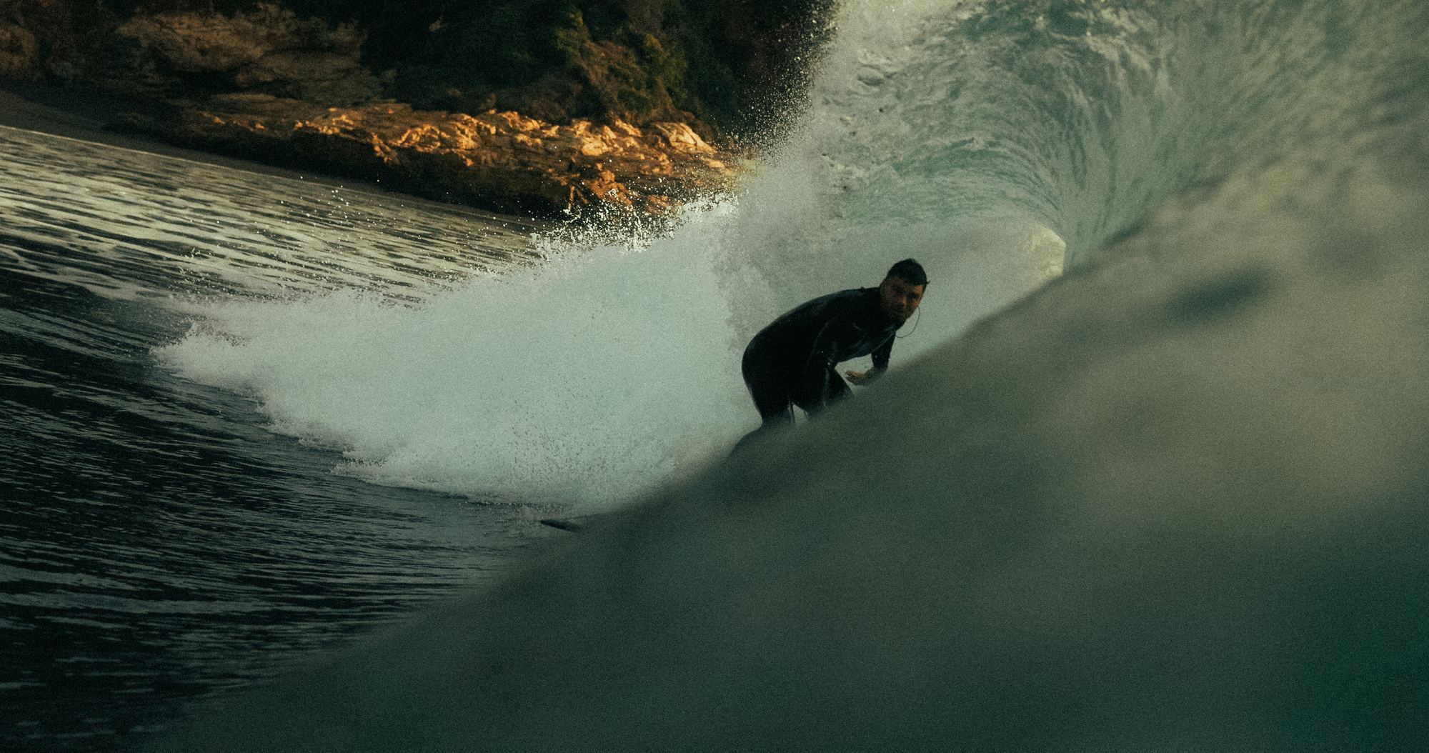 Surfer inside barrel
