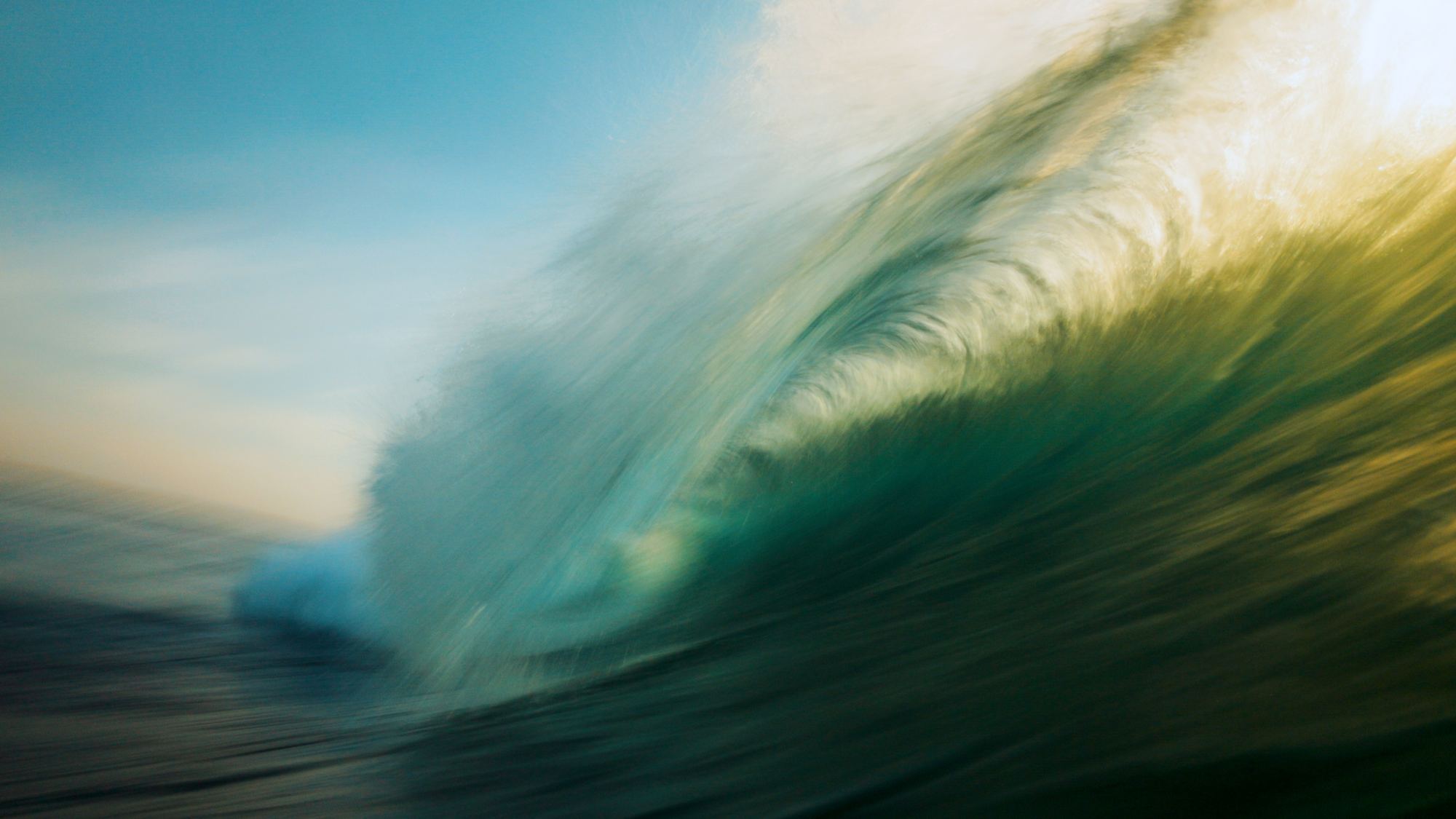 Wave abstract teal gold motion blur